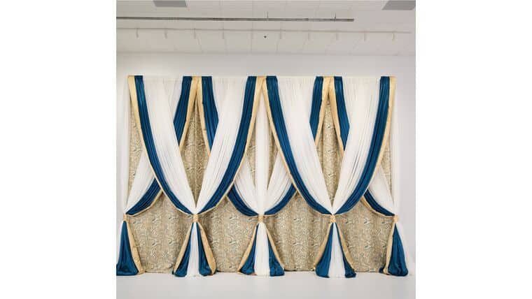 Drapery – Package – 14’H x 16’W Martinique Gold & Teal Backdrop | Rental