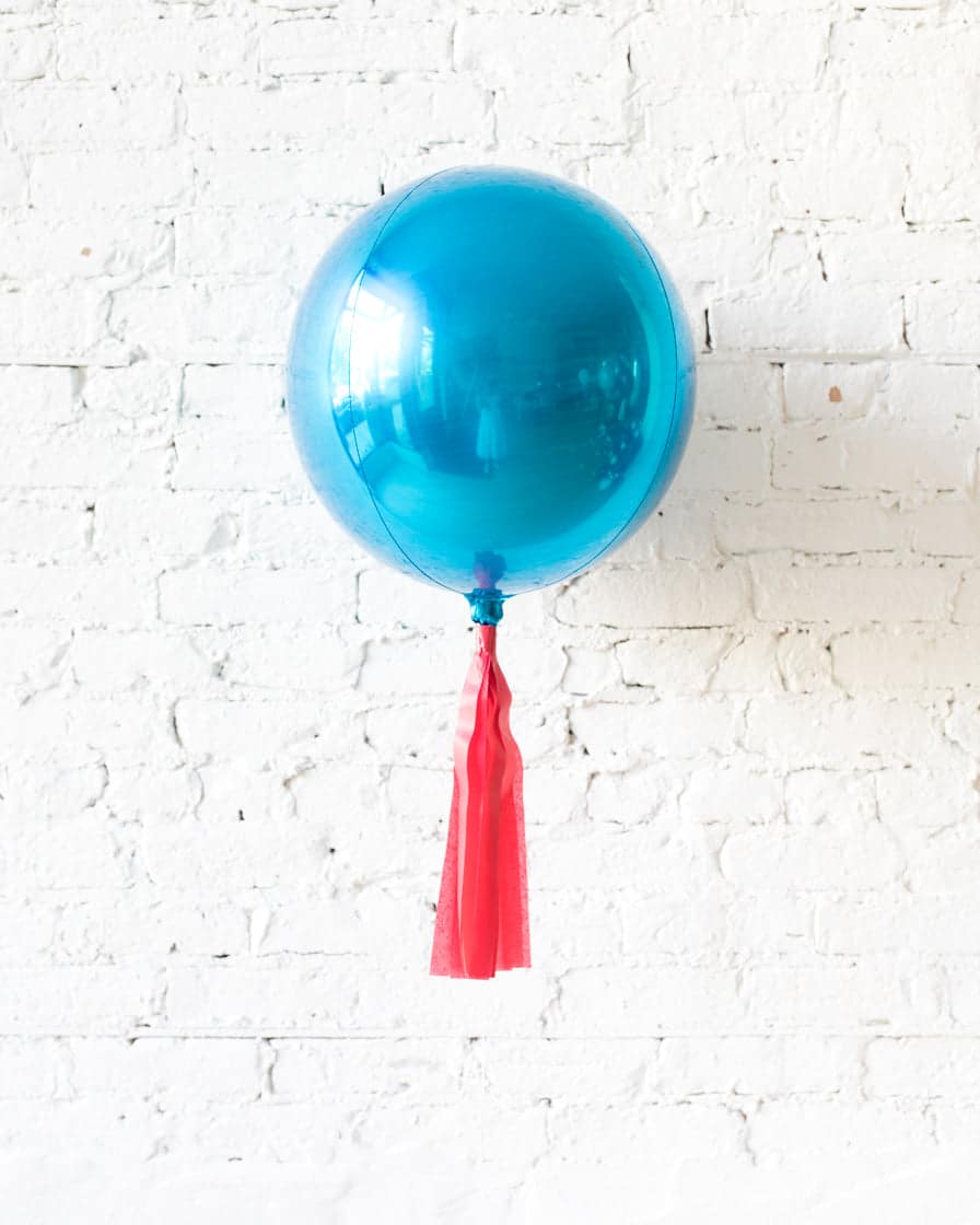16in Blue Orb Foil Balloon and Red Skirt | Rental